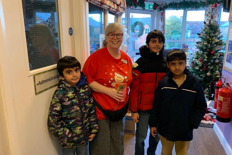 Ahmadiyya Muslim Youth Association members with care home staff.