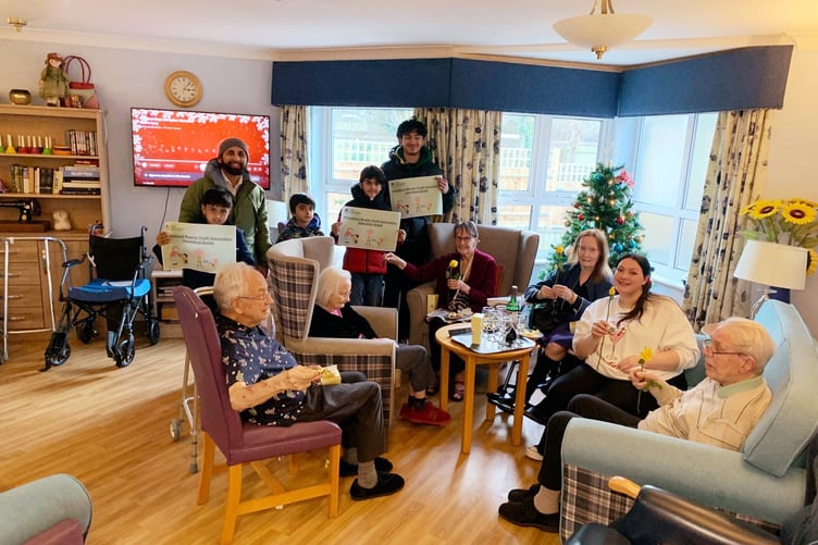 Members of the Ahmadiyya Muslim Youth Association during their visit to a care home in Godalming.