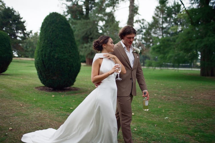 Teresa Boardman, and her husband, Jamie Ellis. // A bride who loves the rush of a getting a good deal has bought four wedding dresses for her nuptials, all for under £1k. Teresa Boardman, 24, snagged four wedding dresses for a total of £850 by shopping on second hand clothing apps and scouring the sales. Teresa and her husband, Jamie Ellis, 26, gat married earlier this year in a Hampshire hotel and also plan to have a second wedding in the Philippines next May to include Teresa's extended family. The fashion-conscious bride decided to wear four dresses across these two events- three at her English wedding and another for the Philippines.