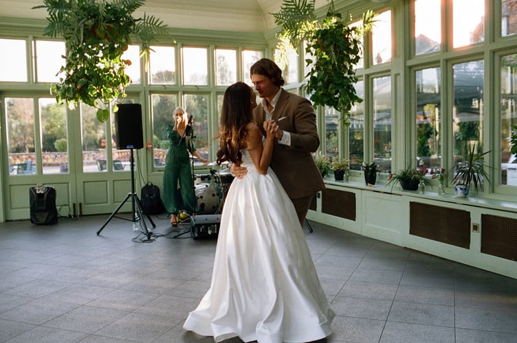 Teresa Boardman, and her husband, Jamie Ellis. // A bride who loves the rush of a getting a good deal has bought four wedding dresses for her nuptials, all for under £1k. Teresa Boardman, 24, snagged four wedding dresses for a total of £850 by shopping on second hand clothing apps and scouring the sales. Teresa and her husband, Jamie Ellis, 26, gat married earlier this year in a Hampshire hotel and also plan to have a second wedding in the Philippines next May to include Teresa's extended family. The fashion-conscious bride decided to wear four dresses across these two events- three at her English wedding and another for the Philippines.