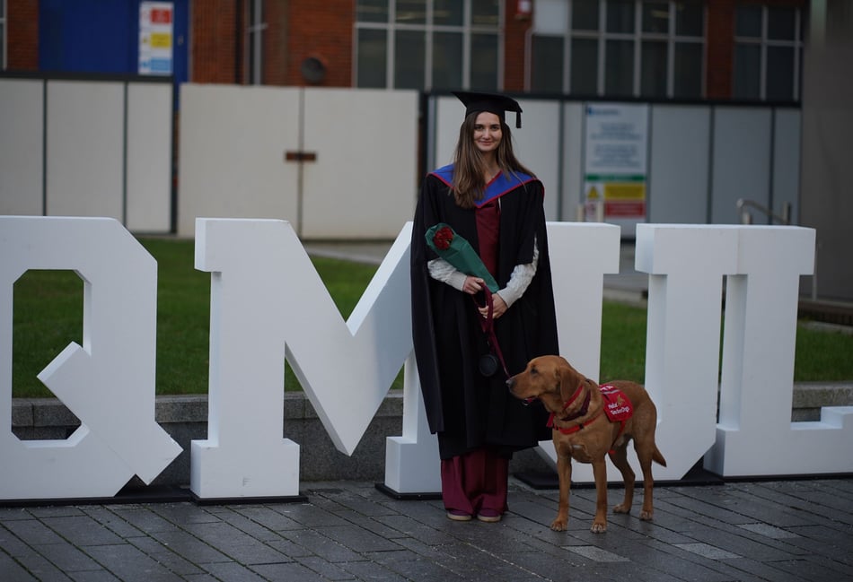 WATCH: Medical alert dog helps woman achieve law career dream