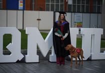 WATCH: Medical alert dog helps woman achieve law career dream