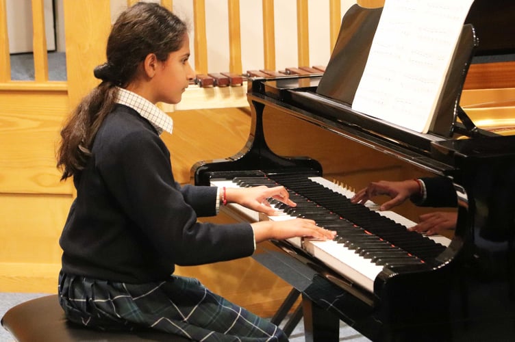Highfield and Brookham pupil excels at the piano as part of the school’s outstanding ABRSM and LAMDA exam results.