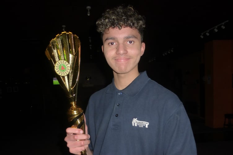 Bordon cueist Lewis Harris shows off his trophy