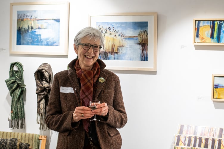 Jacky Paynter with her Pathways series of works at New Ashgate Gallery.