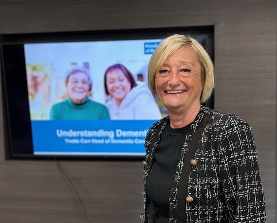 Yvette Carr, Head of Dementia Care at Friends of the Elderly, speaking at The Haslewey Community Centre during the Haslemere dementia support session