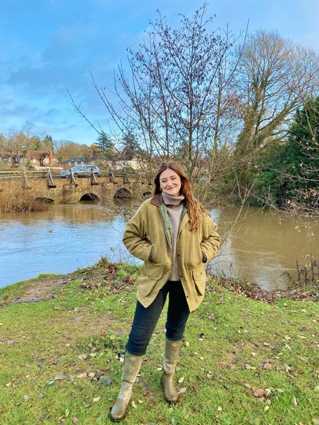 Cllr Phoebe Sullivan in Tilford, warning that local government reform must protect villages and social value.