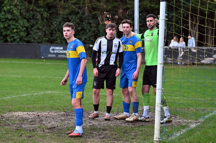 Toby Veale, Louie McCafferty and Chris Clark prepare to defend a corner (Photo: Malcolm Wells)