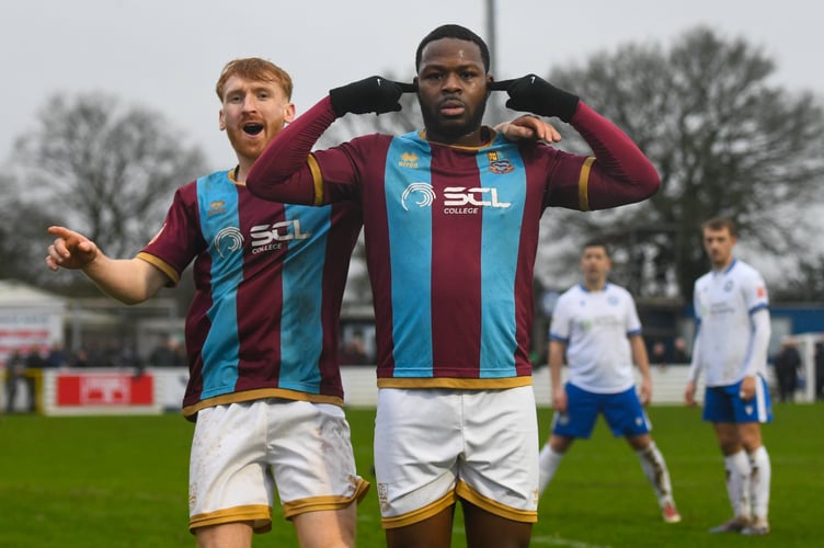Ogo Obi celebrates after scoring Farnham's winner