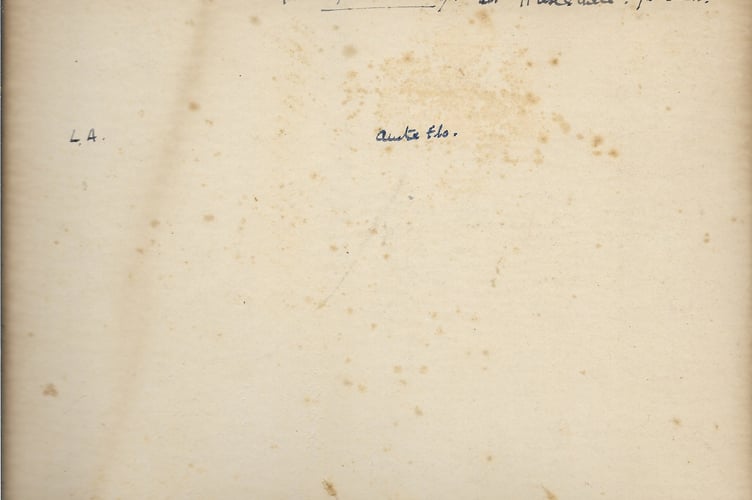 The mystery wedding photograph, with only a handwritten note on the reverse offering clues to its past. Credit: Johnny Bean