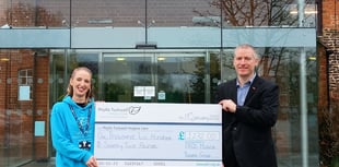 Musical group's £1,272 show of support for hospice