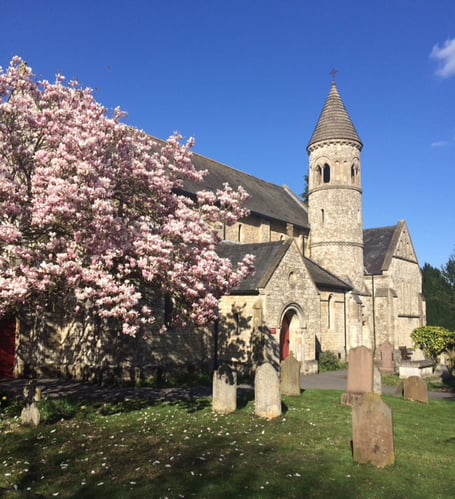 St John's Church in Hale with the blossoms in bloom.