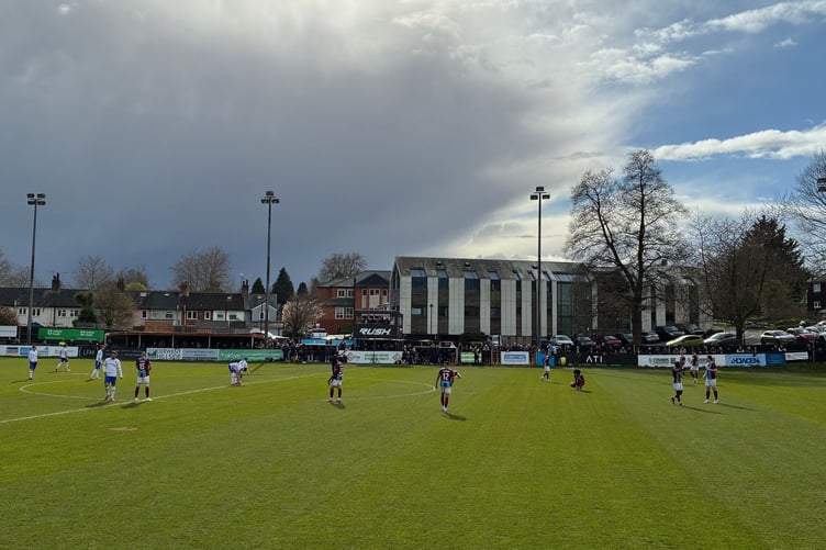Action from Farnham Town's Southern League Premier South match against Chertsey Town