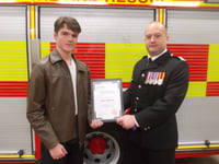 Boy, 15, given award for saving neighbour with defibrillator