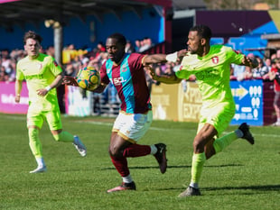 Farnham Town left-back Brandon Mason signs new one-year contract