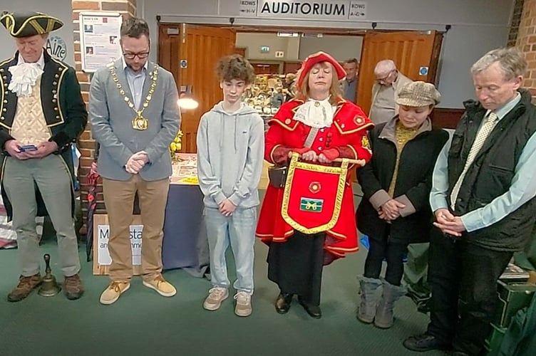 The minute's silence for Martin Holmes at Petersfield Easter Market.