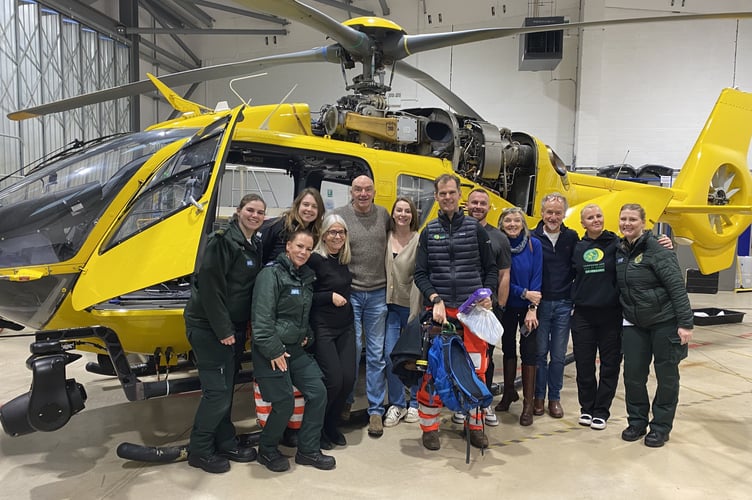 Simon Jordan and Steve Cross meeting the ambulance and air ambulance crews who helped save Simon's life.