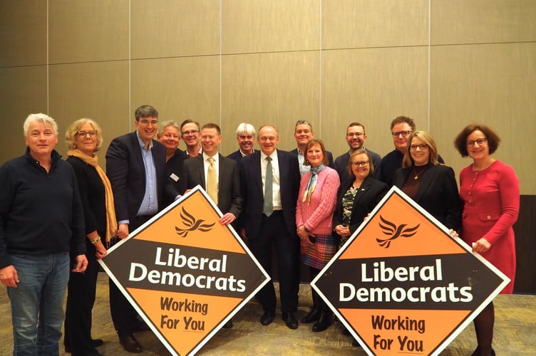 Liberal Democrat Haslemere candidates Mark Ian Merryweather and Oliver Leach with the Liberal Democrat leader during the local election campaign ahead of the May 7 vote, as they set out their priorities for representing the area on the new West Surrey council.