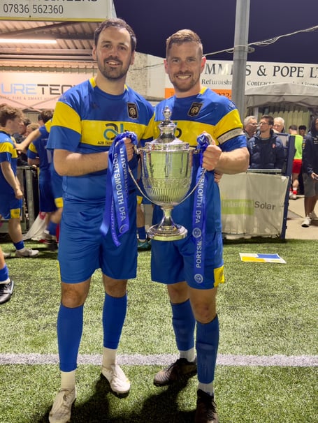 Petersfield Town's Will Essai and Jordan Sullivan celebrate winning the Portsmouth Senior Cup (Photo: Dean Tricker)