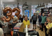 Volunteer honoured for 33 years of service at Oxfam shop