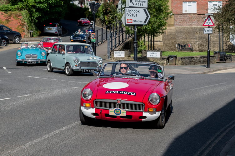 Drivers take part in the pre-show convoy through Surrey, Sussex and Hampshire ahead of the main event at the Haslemere Classic Car Show in Haslemere.