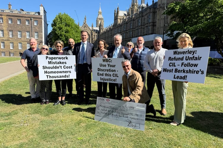 Sir Jeremy Hunt and CIL campaigners outside Parliament.