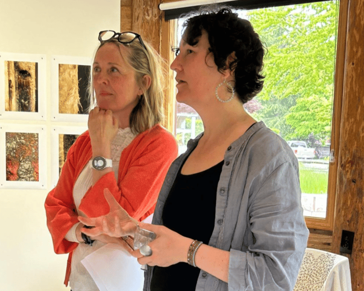 Farnham artist Samantha, left, at one of her art exhibitions.